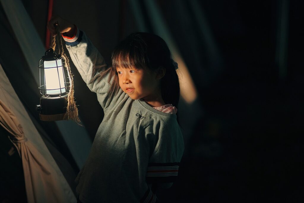 little girl with lamp