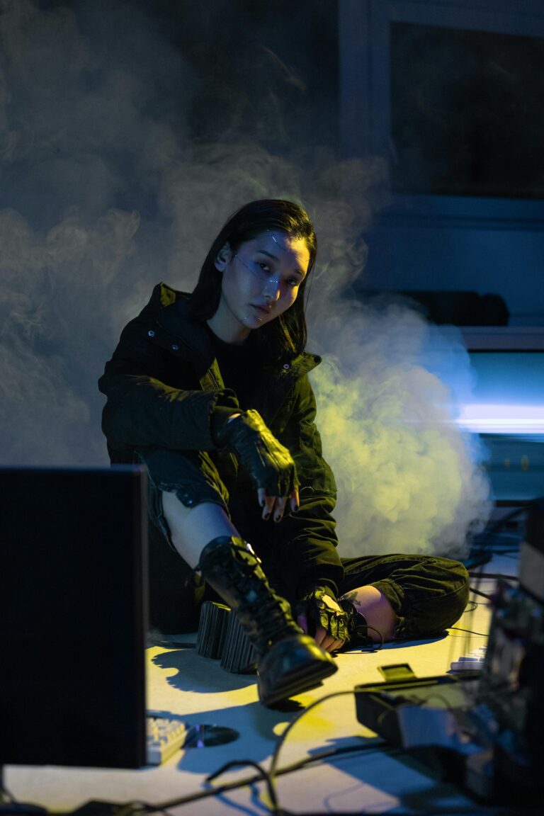 Moody portrait of woman in cyberpunk setting with neon smoke.